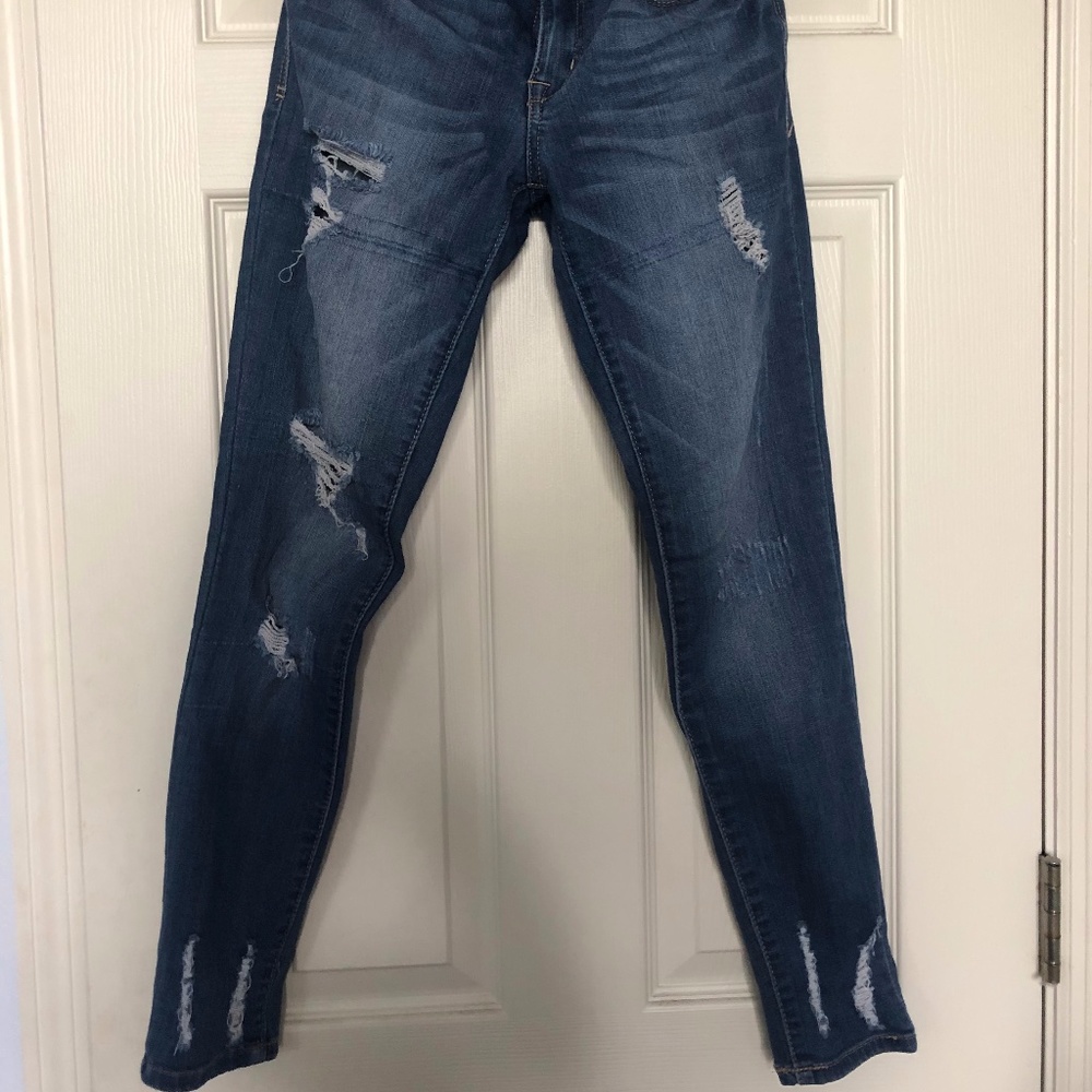 Low-rise Dark distressed skinny jeans